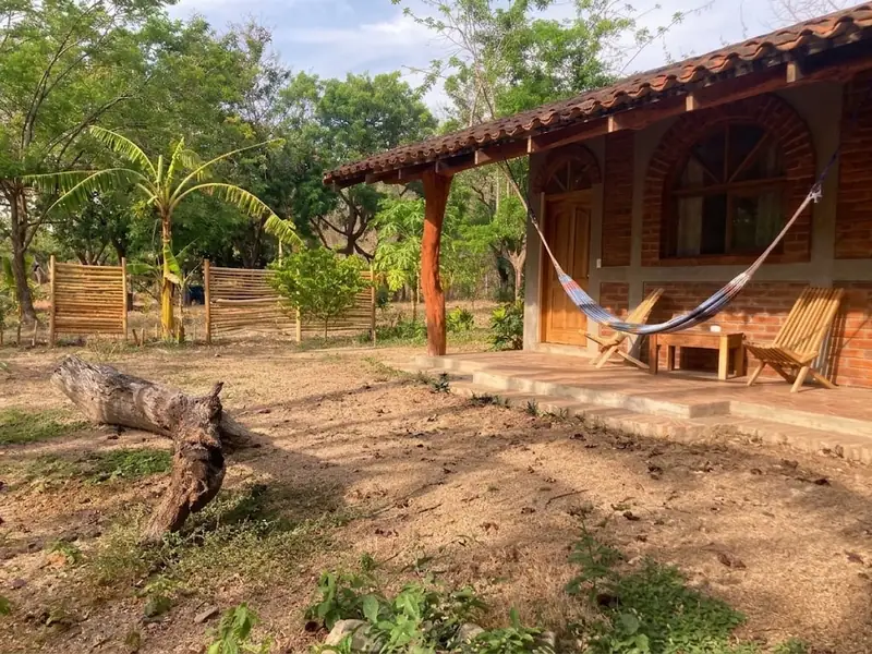 Porch with a hammock and chairs