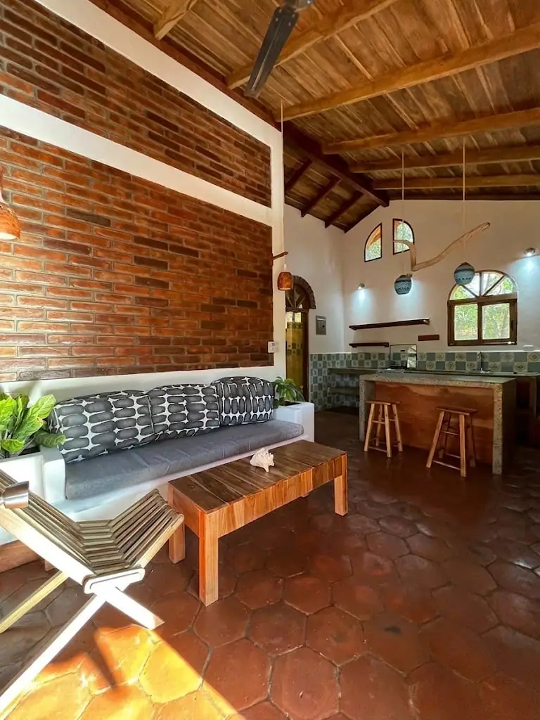 Sitting area with a brick wall