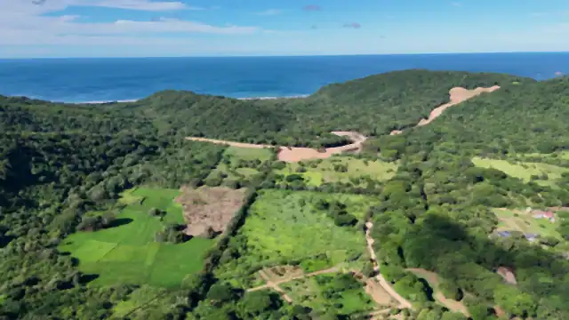 The valley of Las Planadas seen from a drone, down to the Pacific
