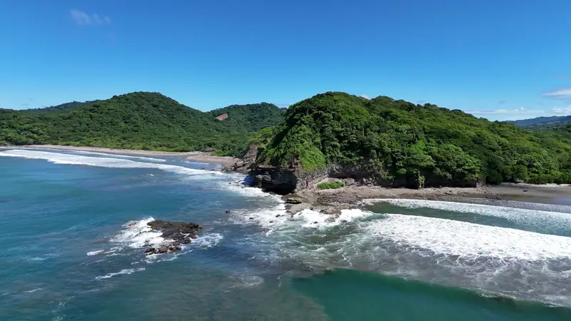 Playa Remanso seen from a drone, rocks and turquoise water
